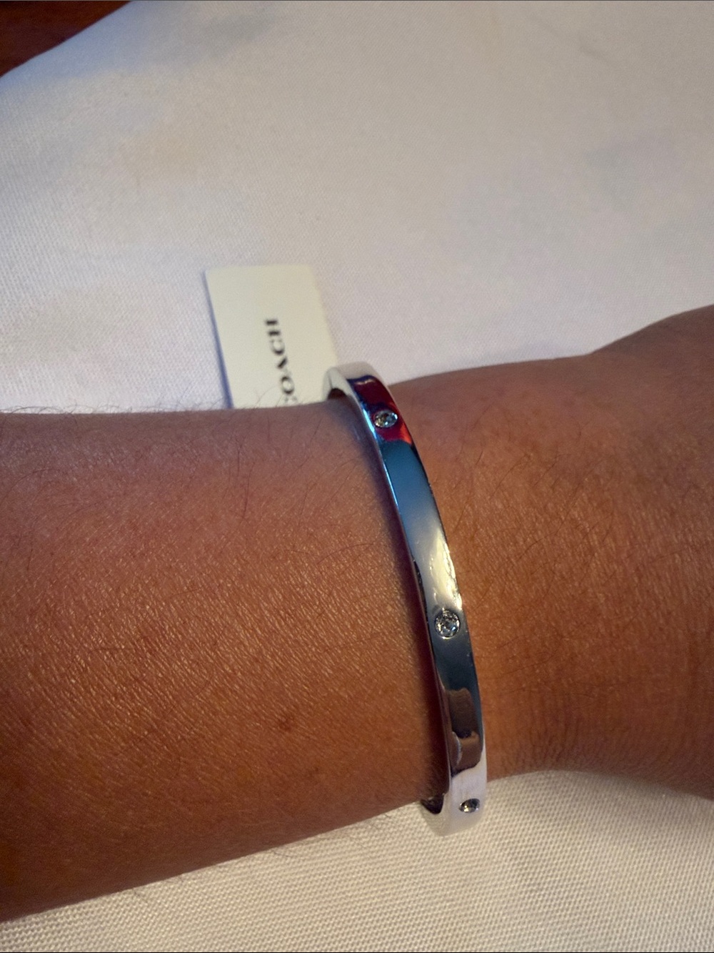 Coach Silver-Tone Crystal Accent Slim Bangle